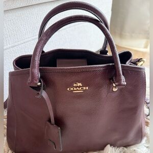 Coach Pebbled Leather Satchel in Burgundy. 12L x 9H with removal straps.